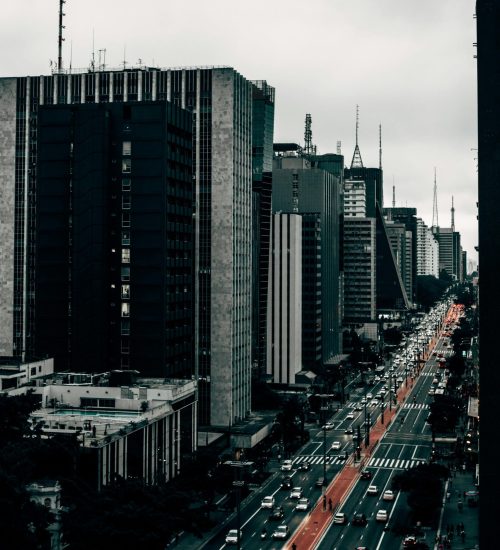 Capture of Avenida Paulista in São Paulo showcasing urban life with towering skyscrapers.